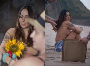Alinne Rosa faz ensaio sensual e topless em praia carioca
