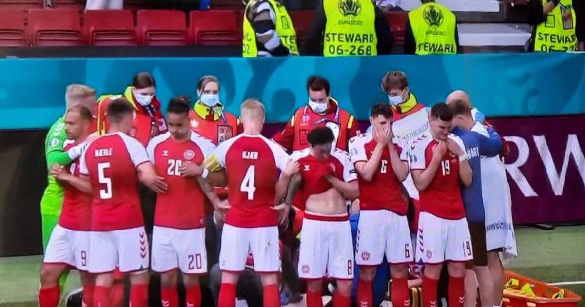 Jogador da Dinamarca sofre parada cardíaca durante jogo da Eurocopa; jogo é suspenso